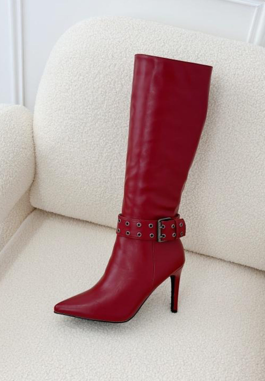 Red buckle long heeled boot